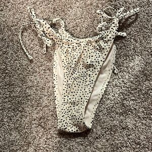 cream and black polka dot swim bottoms